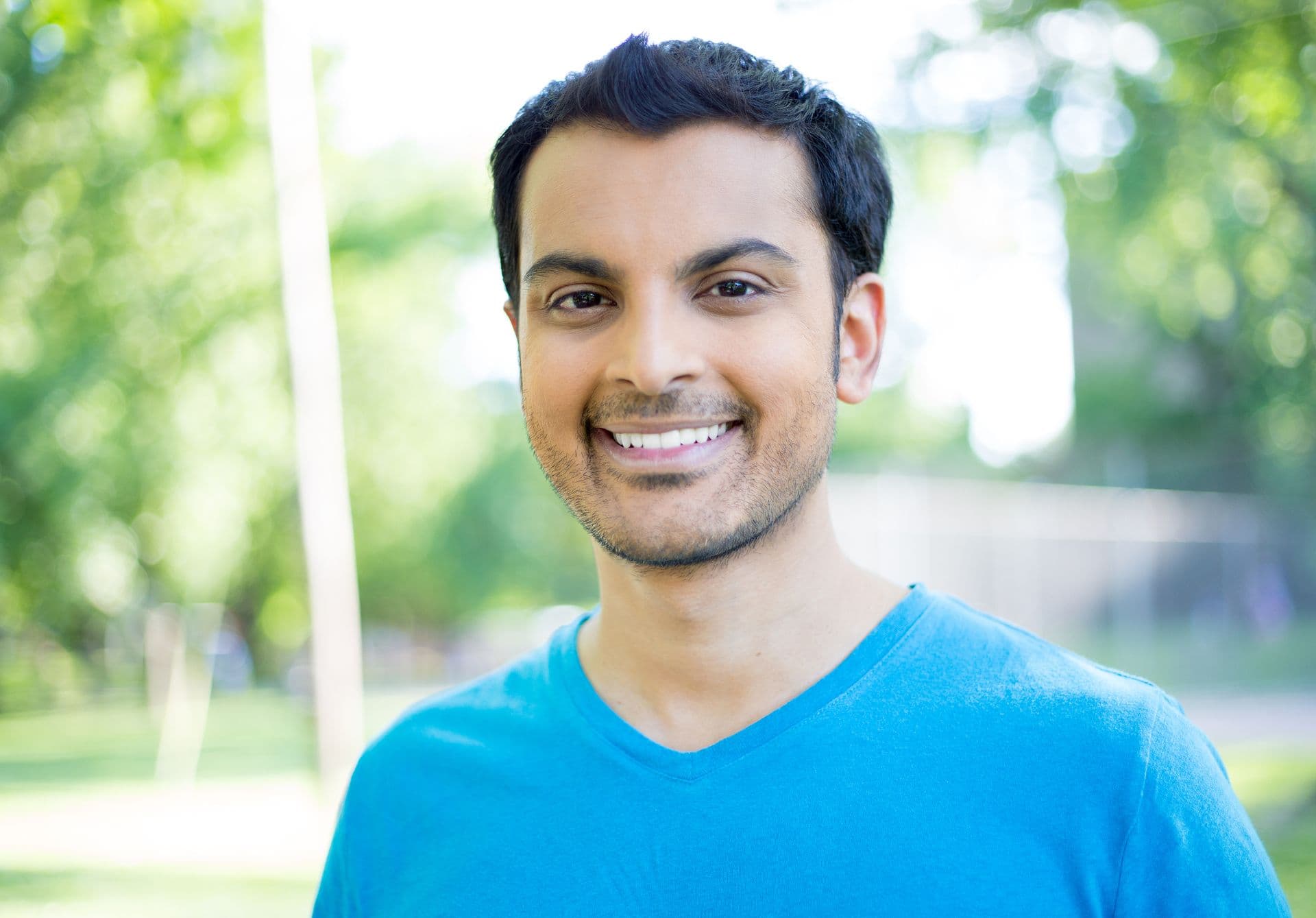Man smiling outside