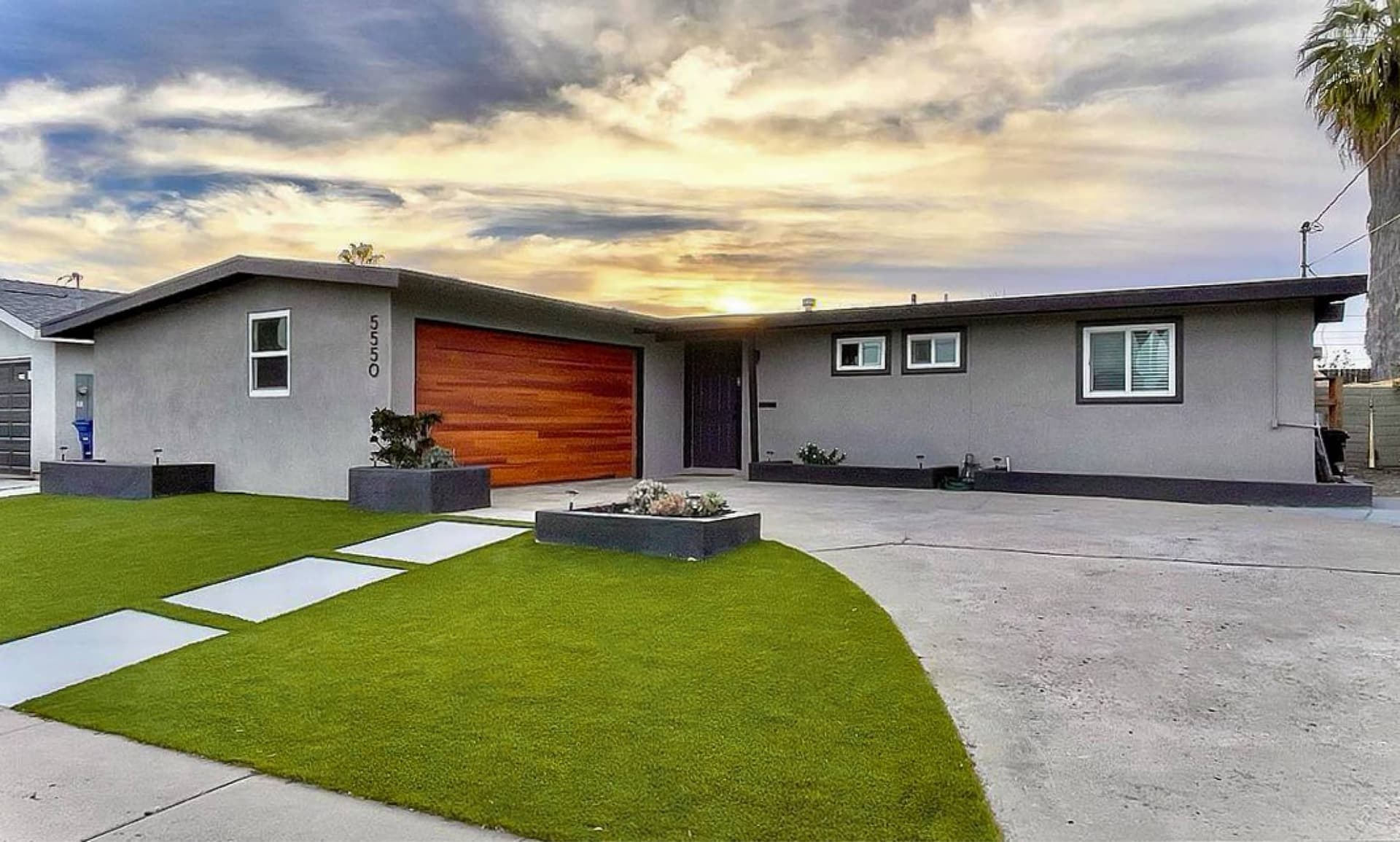 CHI plank garage door with mid century home